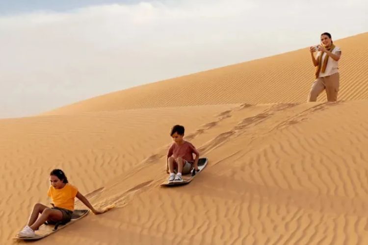 Sandboarding in the Desert